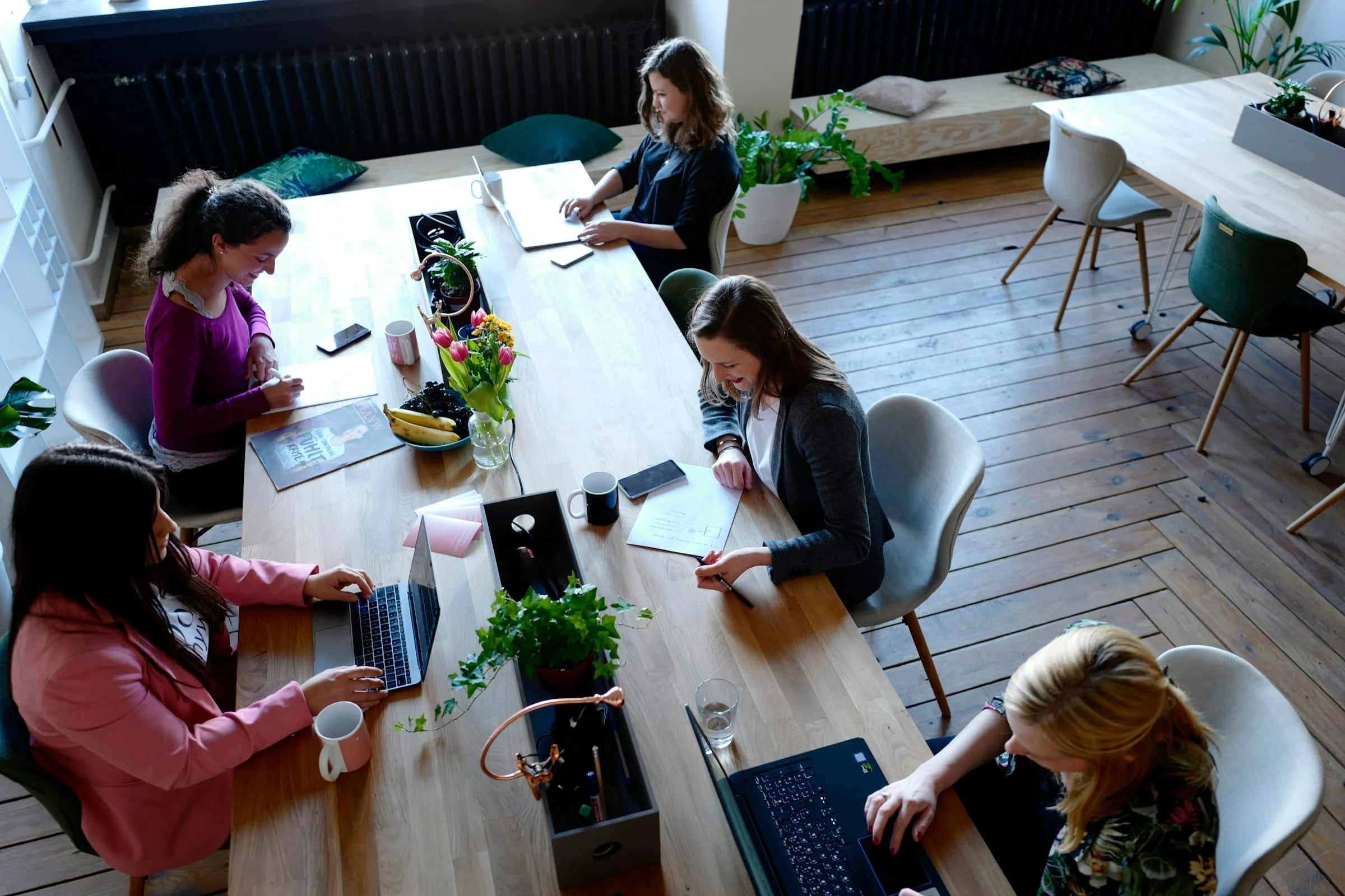 Team meeting around a table to plan a practice's marketing