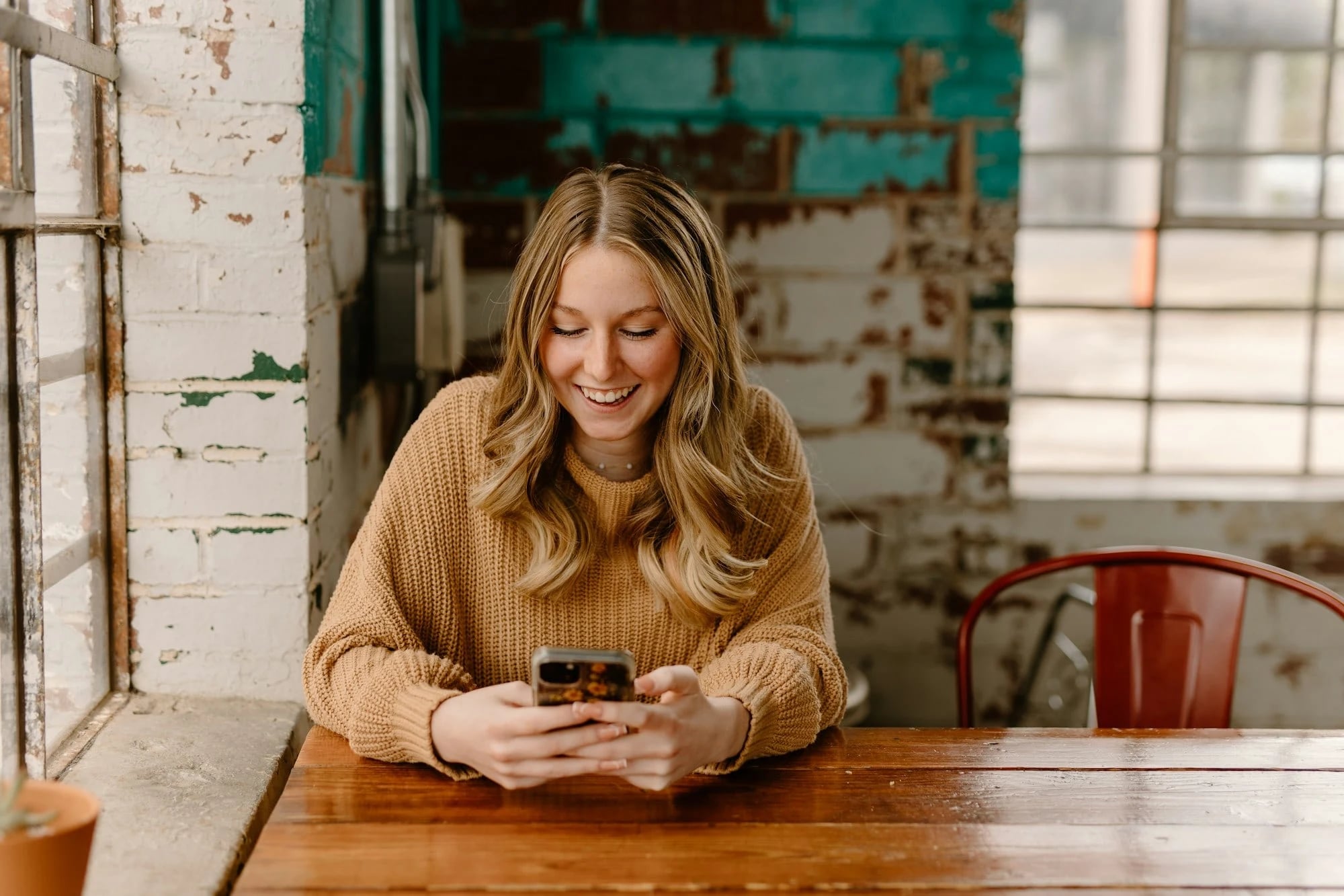 Woman looking up a dental practice on her phone