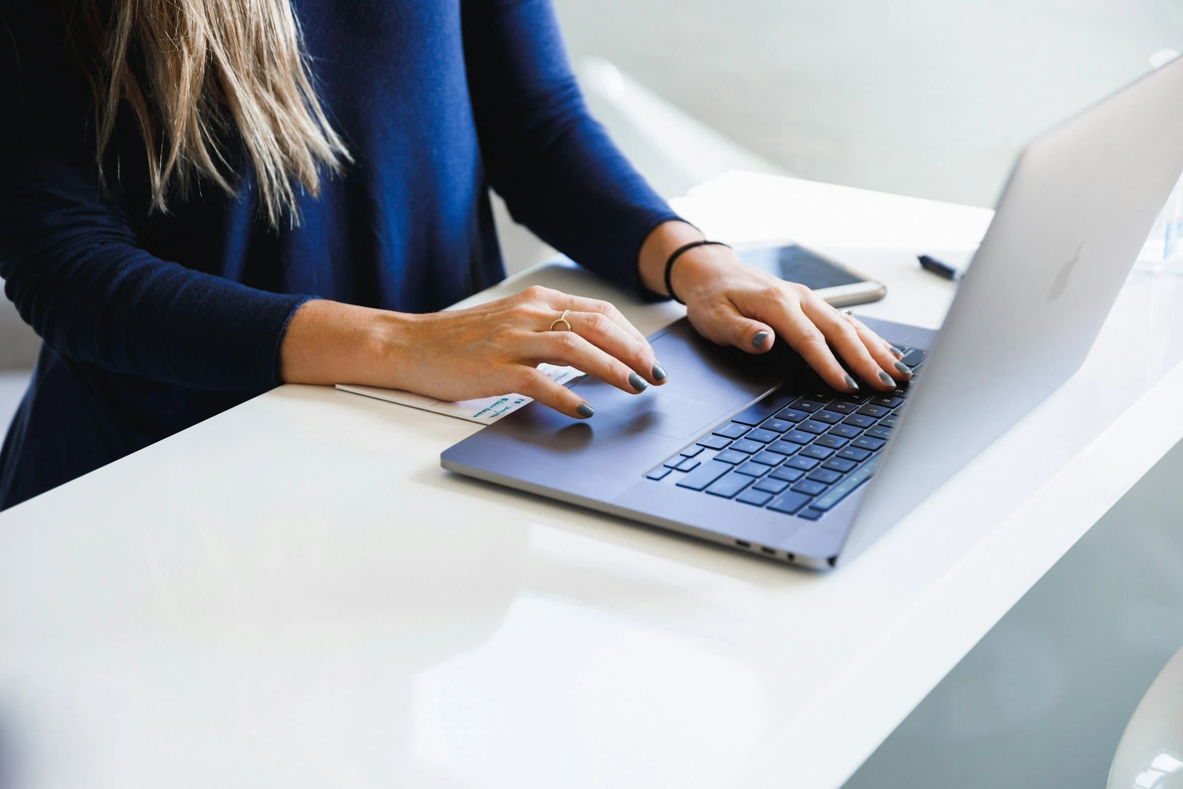 Woman researching on her laptop